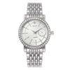 A silver tone quartz wristwatch with a crystal face and metal link bracelet.