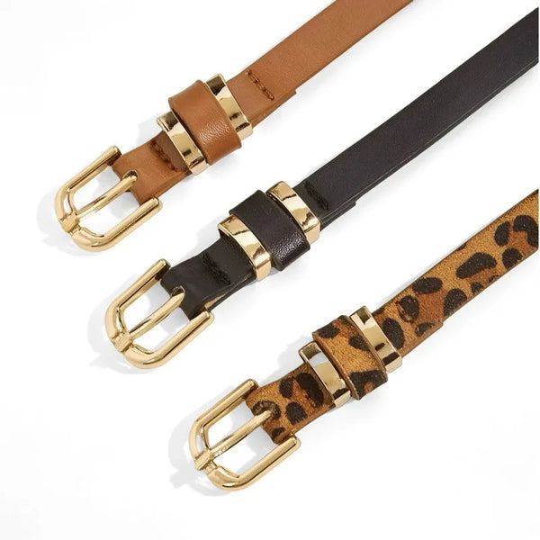 A set of three slim PU leather belts in brown, black, and leopard print with gold vintage buckles.