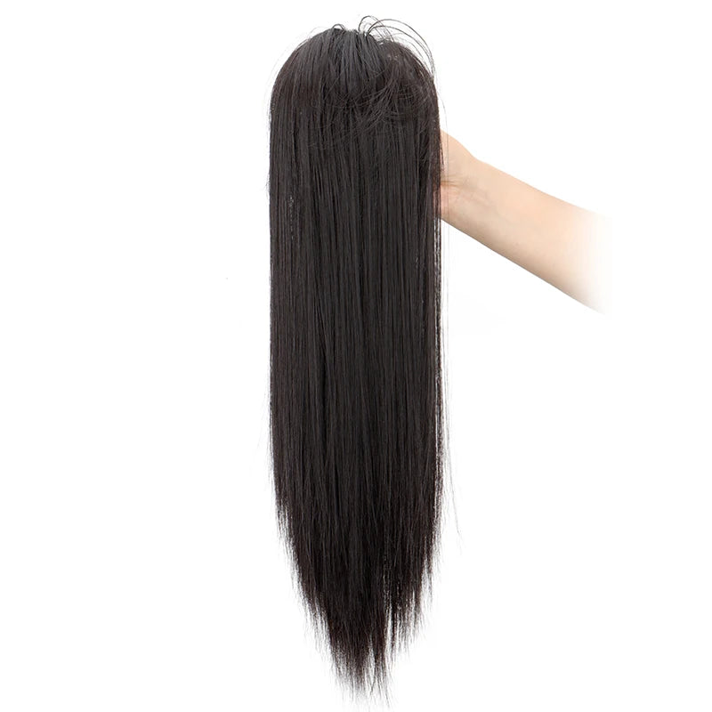 Long, straight black hair extension being held by a hand.