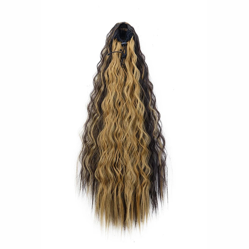 A long, dark brown and blonde kinky curly ponytail hair extension with a clip-in.