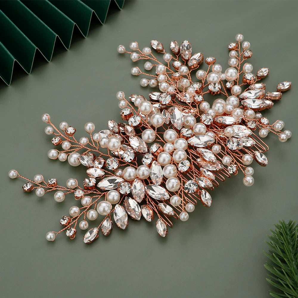 A delicate bridal headpiece made of rose gold wire adorned with pearl and clear rhinestone embellishments.