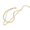 A gold double snake anklet with a chain and clasp is displayed against a white background.