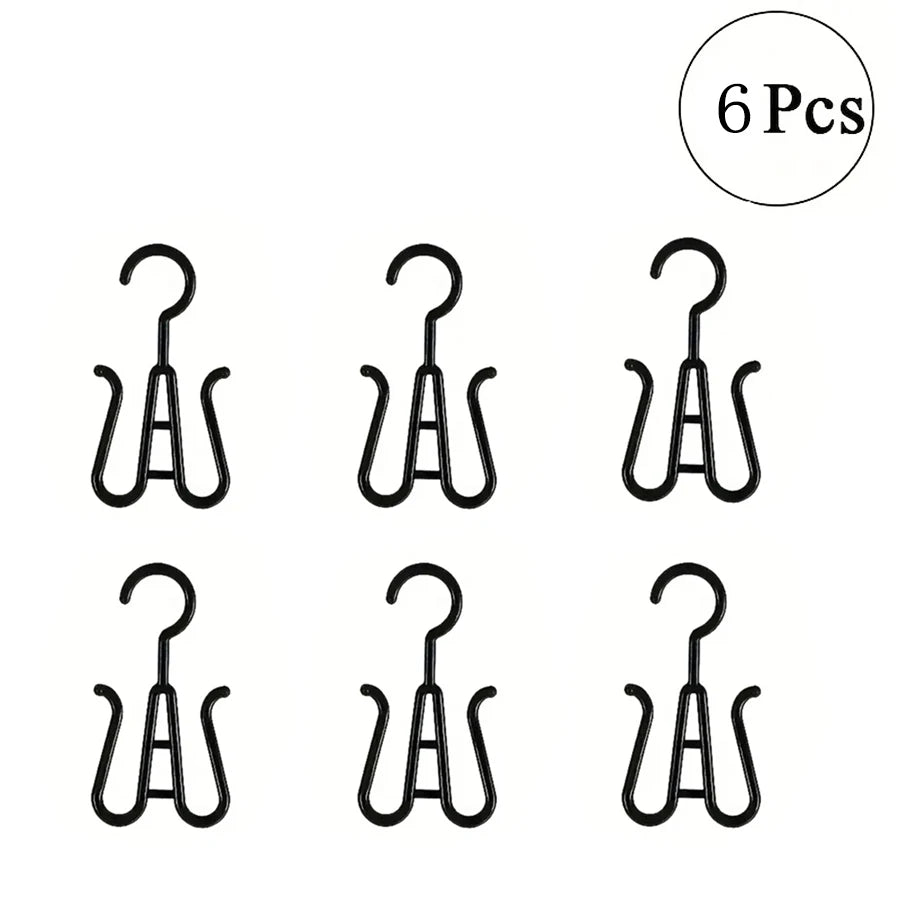 Six pieces of multi-use wig and accessory hangers.