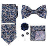 A set of men's formal tie and accessory featuring a blue floral patterned tie, bow tie, and pocket square.