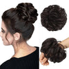 A woman shows off a dark hair updo style with messy bun hair piece scrunchies.