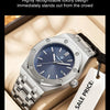 A silver luxury square quartz men's watch is displayed in a box with a white sale price tag.