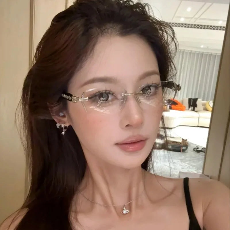A close-up portrait of a woman wearing retro diamond-edged anti-blue light glasses.