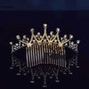 A sparkling crystal princess tiara hair comb for women displayed on a dark reflective surface.