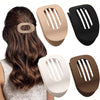 A set of flat circular hair clips in beige, black, and white shown alongside a woman's hair.