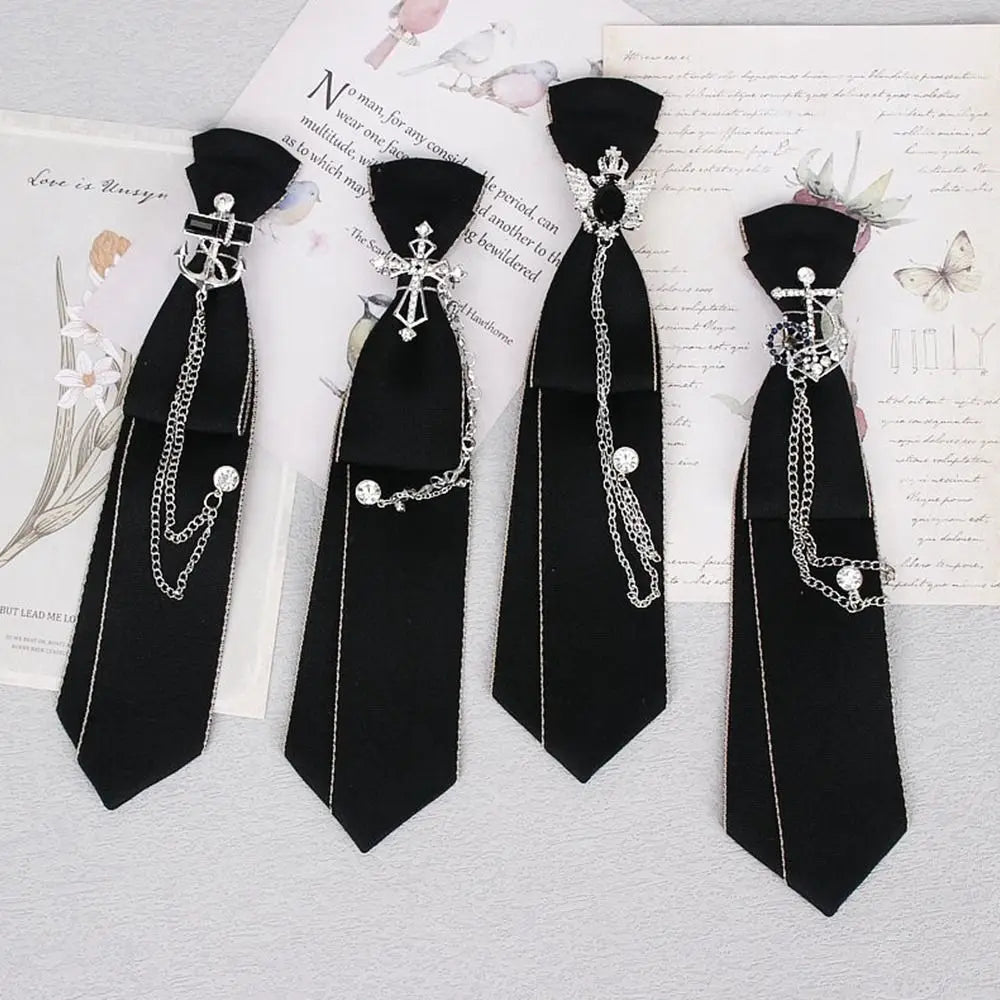 Black gothic crystal rhinestone bow tie neckties displayed on a white background with floral and script elements.