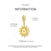 A gold-toned sun charm pendant on a silver chain.