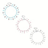 Stainless steel anklet featuring blue rhinestone pendants.