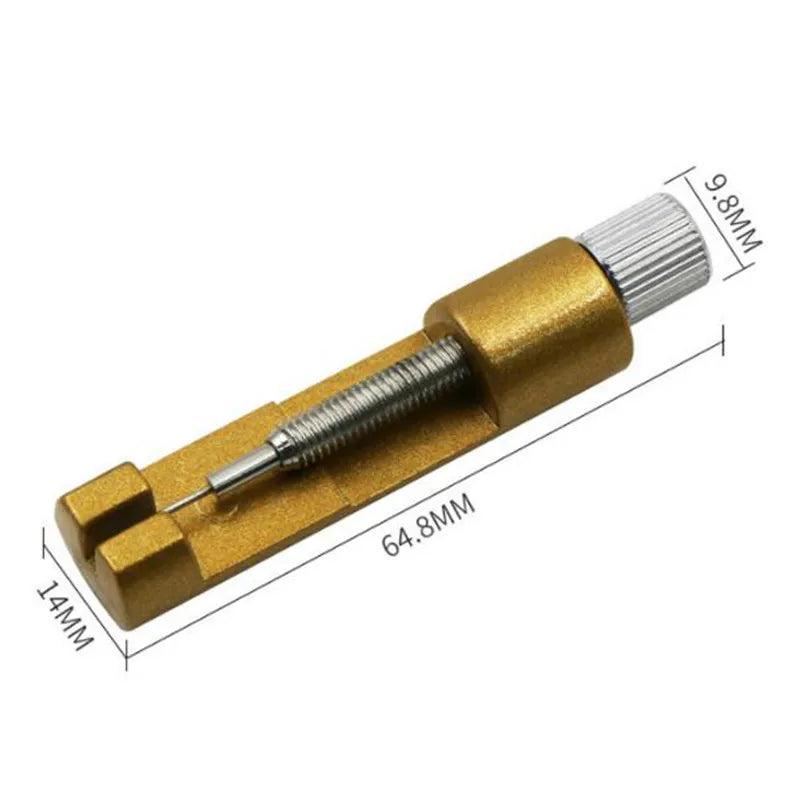 A brass precision metal watch strap adjuster tool with a threaded shaft and a ribbed tip.