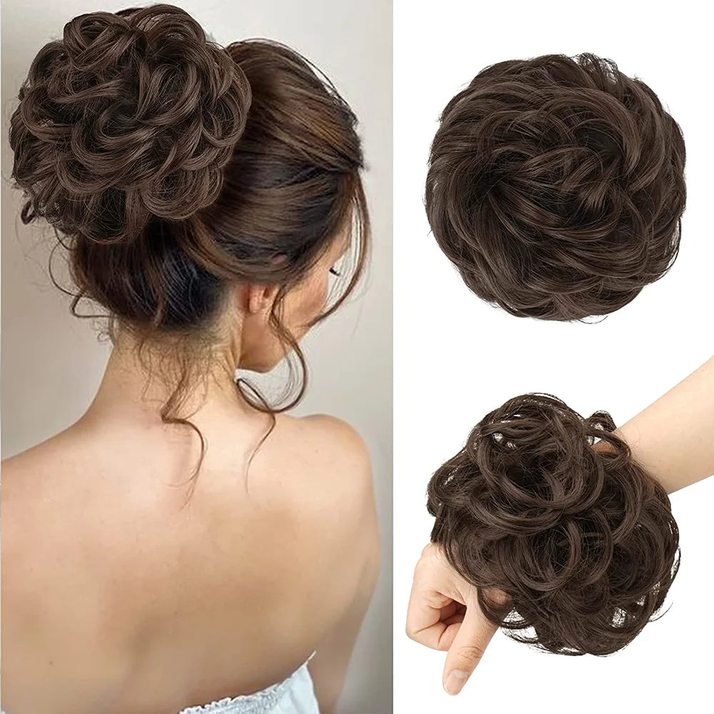 A close-up of a woman's hair styled in an elegant messy bun with scrunchies.