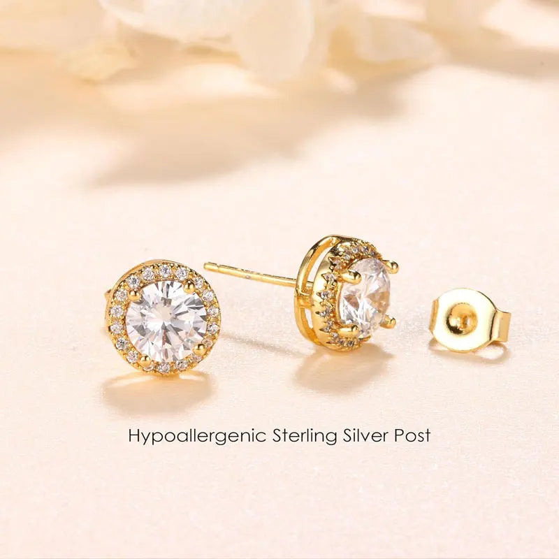 Gold plated simulated diamond stud earrings with a sterling silver post and backing.