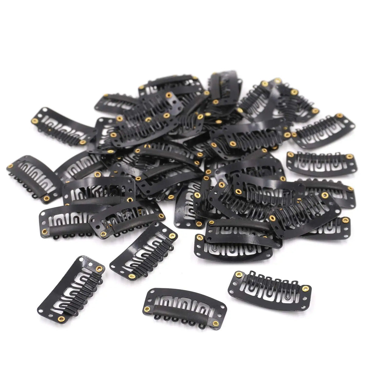 A pile of black precision snap hair extensions for bangs.