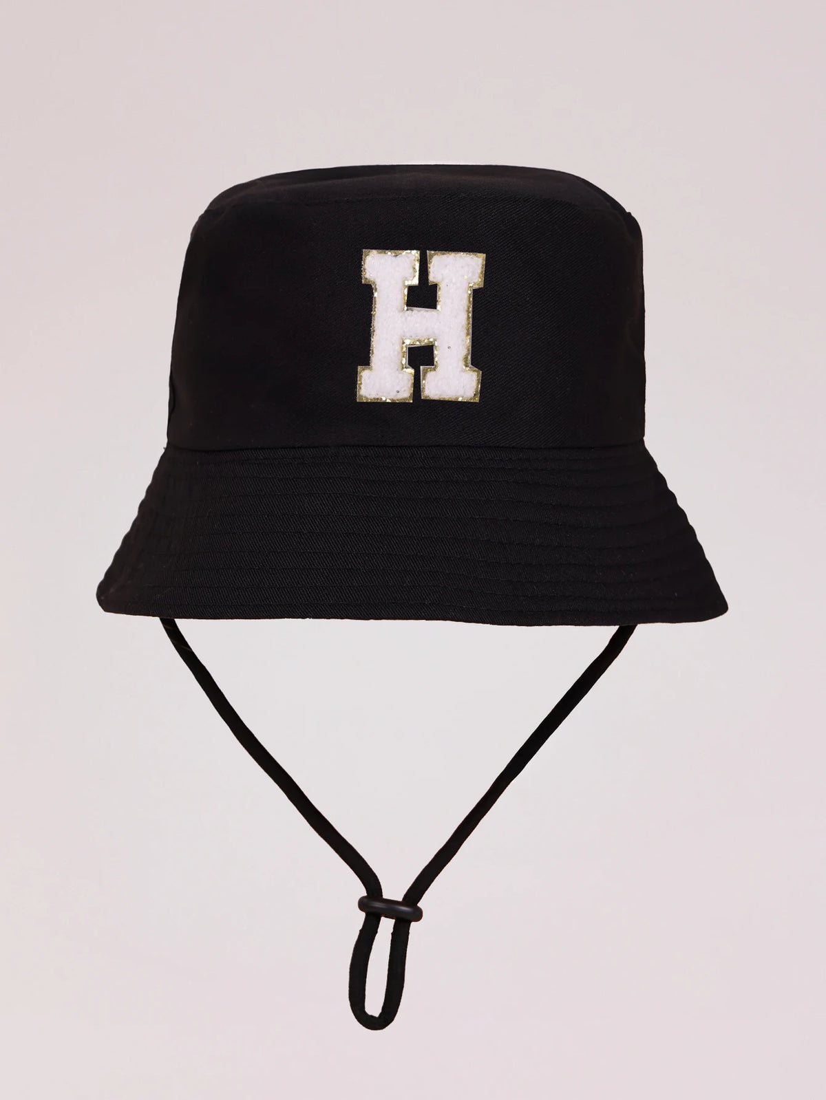 Black sun hat with a white letter H embroidered on the front and an adjustable cord.