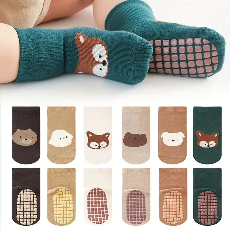 A set of cute cartoon animal socks for kids featuring various designs and patterns.
