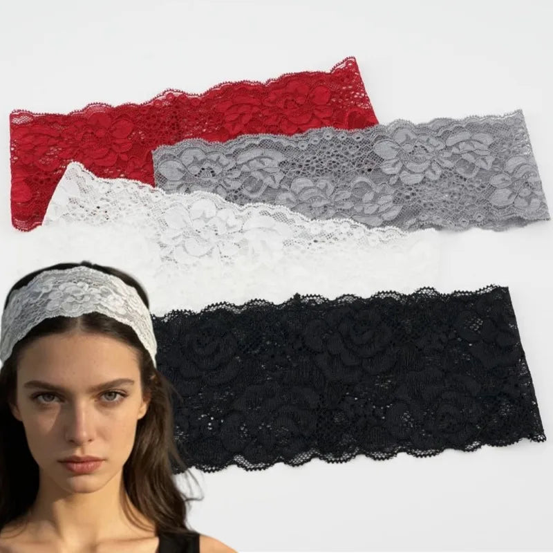 A woman models a black floral lace hair headband against a white background.