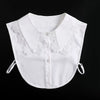 White blouse with a false collar featuring delicate lace trim on the neckline and adjustable straps.