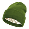 A close-up view of a forest green satin-lined beanie hat.