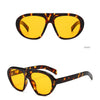 Front view of semi-yellow leopard print sunglasses with tortoiseshell frames
