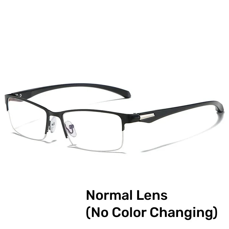 Une paire de lunettes de lecture à monture noire et verres clairs sur fond blanc.