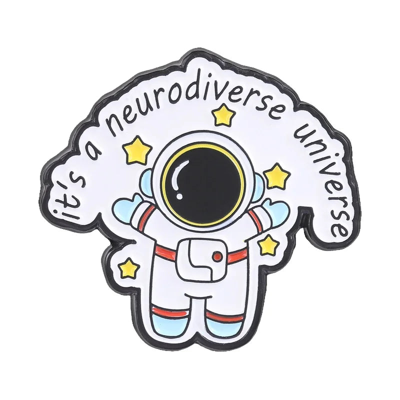 Enamel pin featuring a cartoon astronaut in space with stars and the text Its a neurodiverse universe