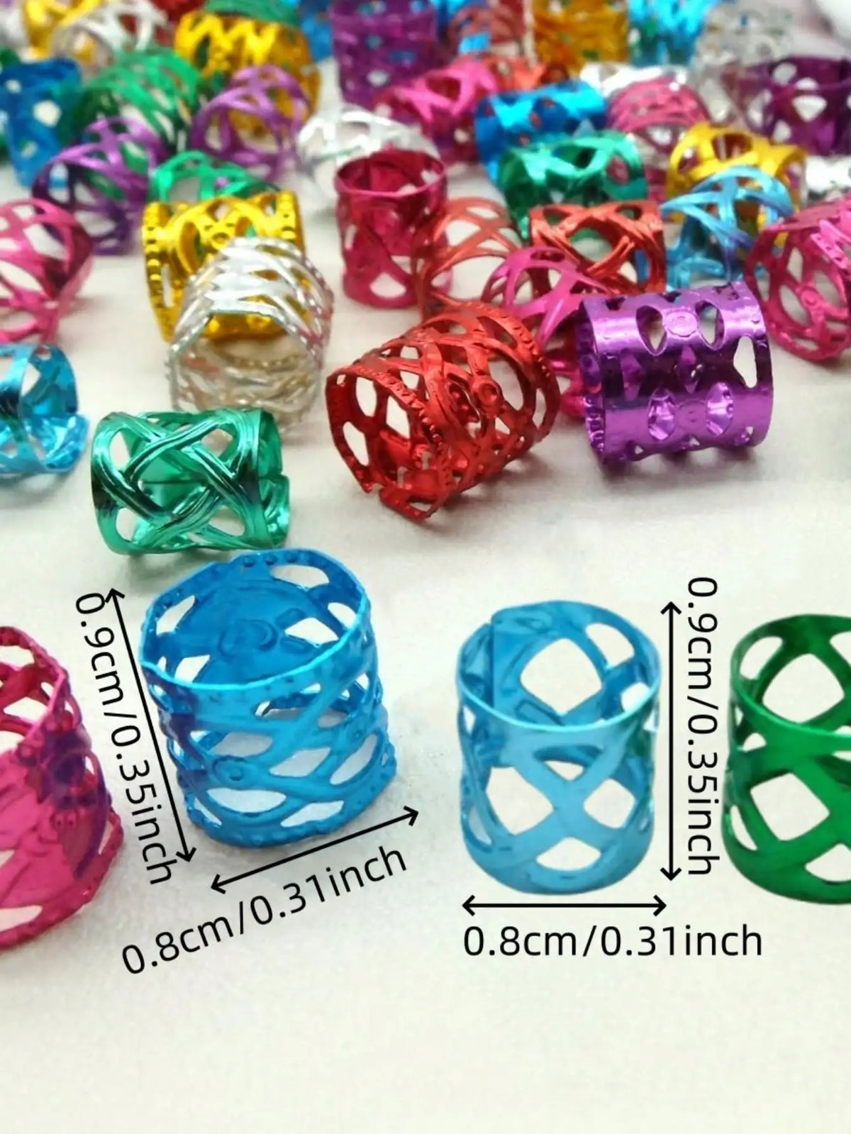A collection of multicolor dreadlock hair rings in various shades and sizes.