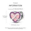 A sterling silver heart-shaped charm with an infinity design and purple stones.