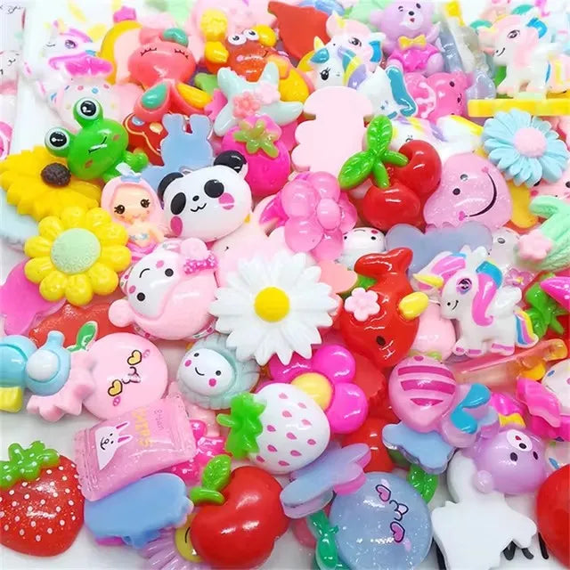 A colorful set of 10 kawaii resin nail art charms featuring various cute shapes and characters.