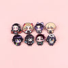 A set of eight cute enamel cartoon brooches featuring various stylized characters and hair colors.