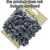 A pile of gray satin hair scrunchies is shown on a cardboard background.