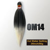 A bundle of black and white pre-stretched Kanekalon braiding hair extensions labeled OM14 with a hot water setting instructio