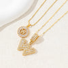 Gold necklace set featuring CZ crystal pendants shaped like letters and lightning bolts.