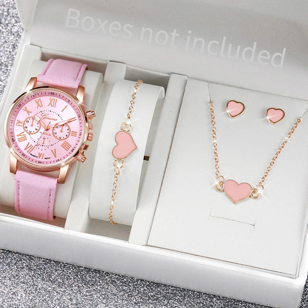 A pink fashion quartz wristwatch with a leather strap and matching gold-tone earrings displayed in a white box.