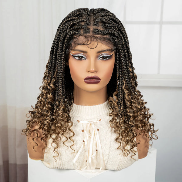 A woman modeling a long, dark brown boho box braid wig with dramatic eye makeup and a cream-colored sweater.