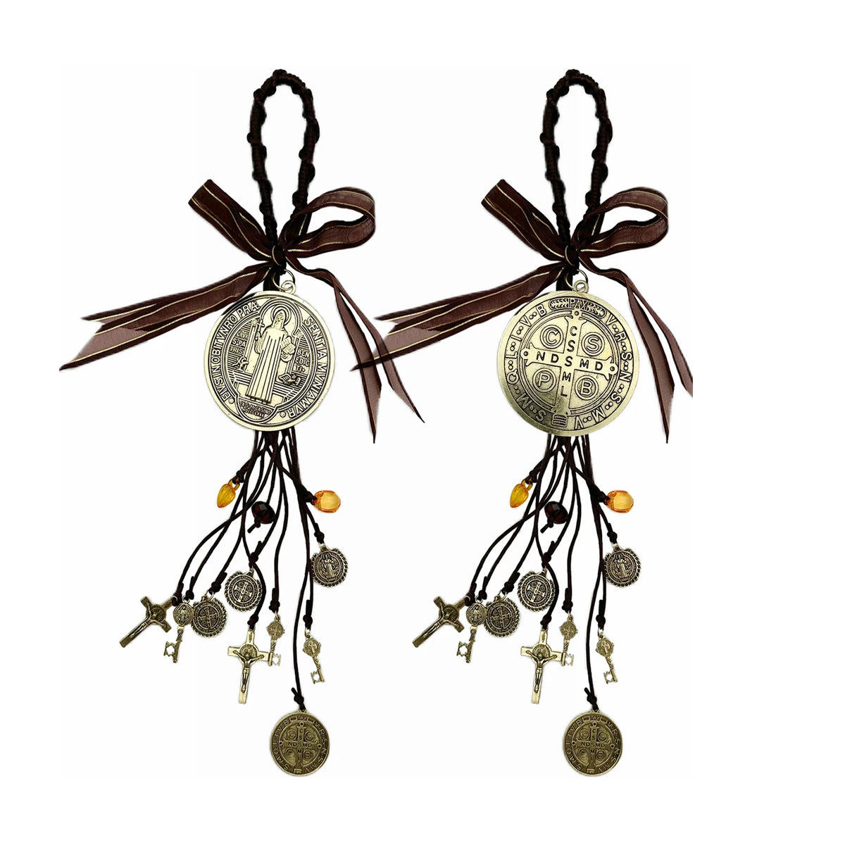 A pair of antique gold-toned Saint Benedict protection charm sets with dark brown ribbons and dangling charms.