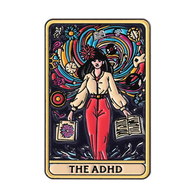 A tarot card enamel pin featuring a woman with dark hair and flowers surrounded by colorful cosmic elements, labeled The ADHD