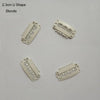 A set of 2.3cm U shape blonde precision hair extension clips.