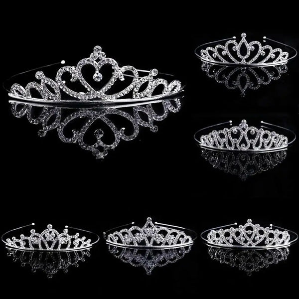 Silver crystal hair crown for women shown in multiple reflections against a black background