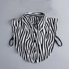 Black and white zebra print blouse with a false collar and detachable neckline