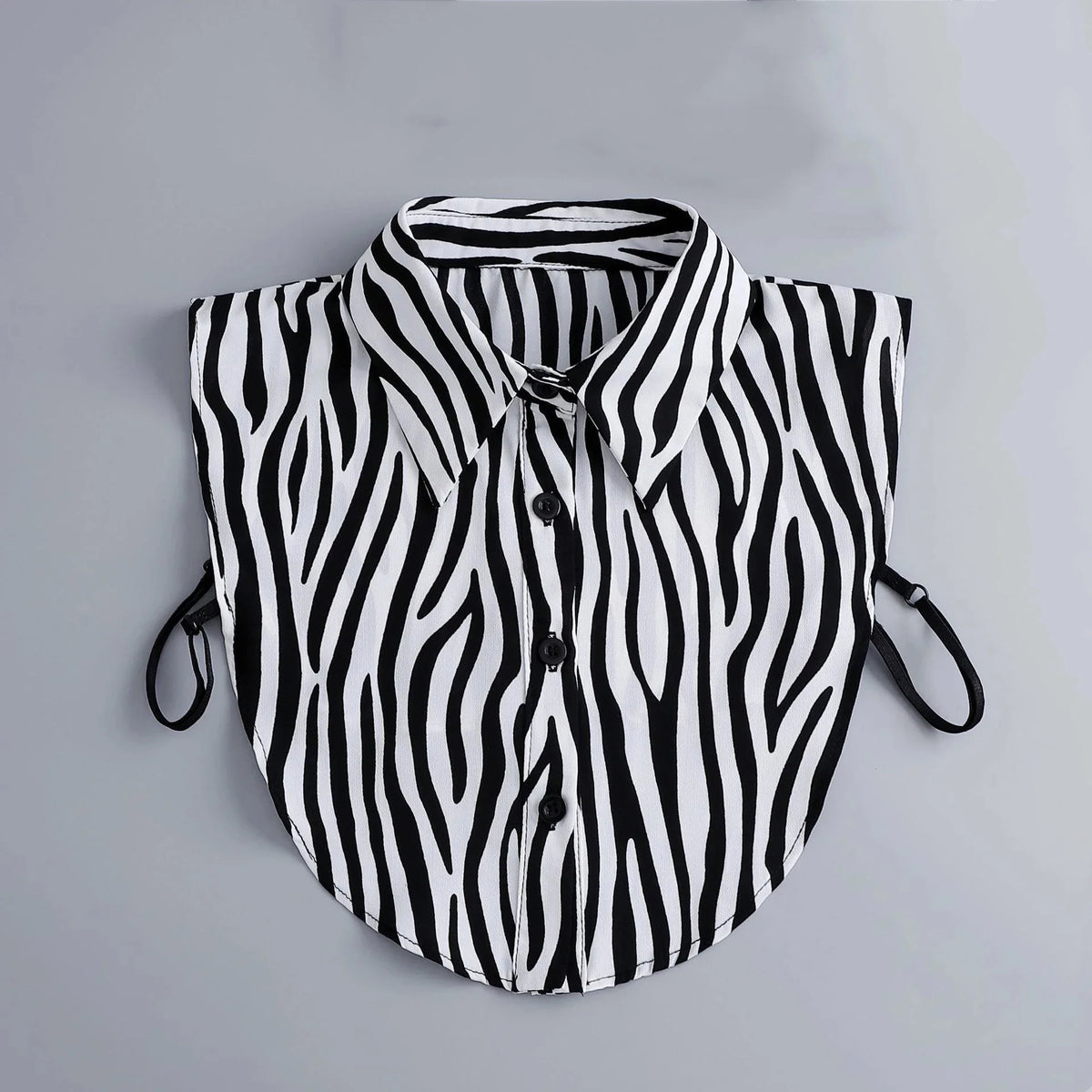 Black and white zebra print blouse with a false collar and detachable neckline