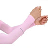 Person wearing pink arm warmers for sports and sun protection