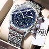 Un reloj cronógrafo de lujo para hombre, plateado y azul, exhibido en una caja de color claro.