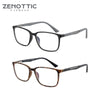 Paire de lunettes de lecture noires carrées anti-lumière bleue avec des montures métalliques fines.