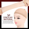 A hand is stretching a nude colored wig cap material, shown next to a mannequin head.