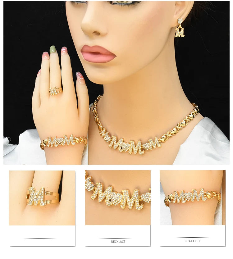 A set of 18K gold heart crystal jewelry including a necklace and bracelet displayed on a model's hand and neck.