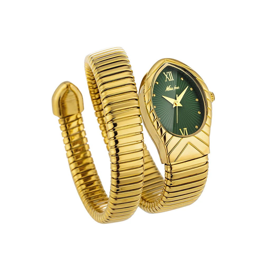 A gold-toned ladies watch with a snake design on the strap and a green face.