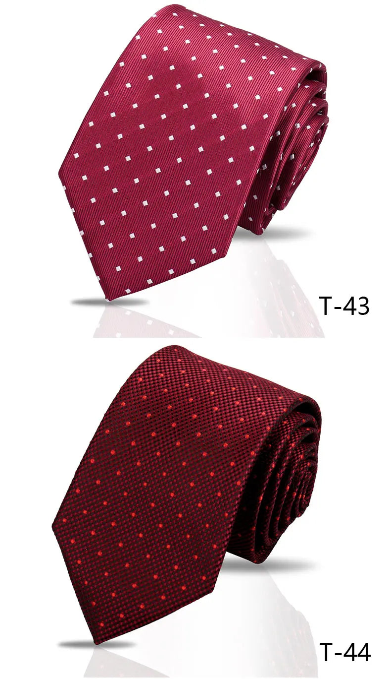 A close-up of a maroon patterned silk necktie shown folded, labeled T-43 and T-44.